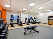 fintess center with weights machines and towels
