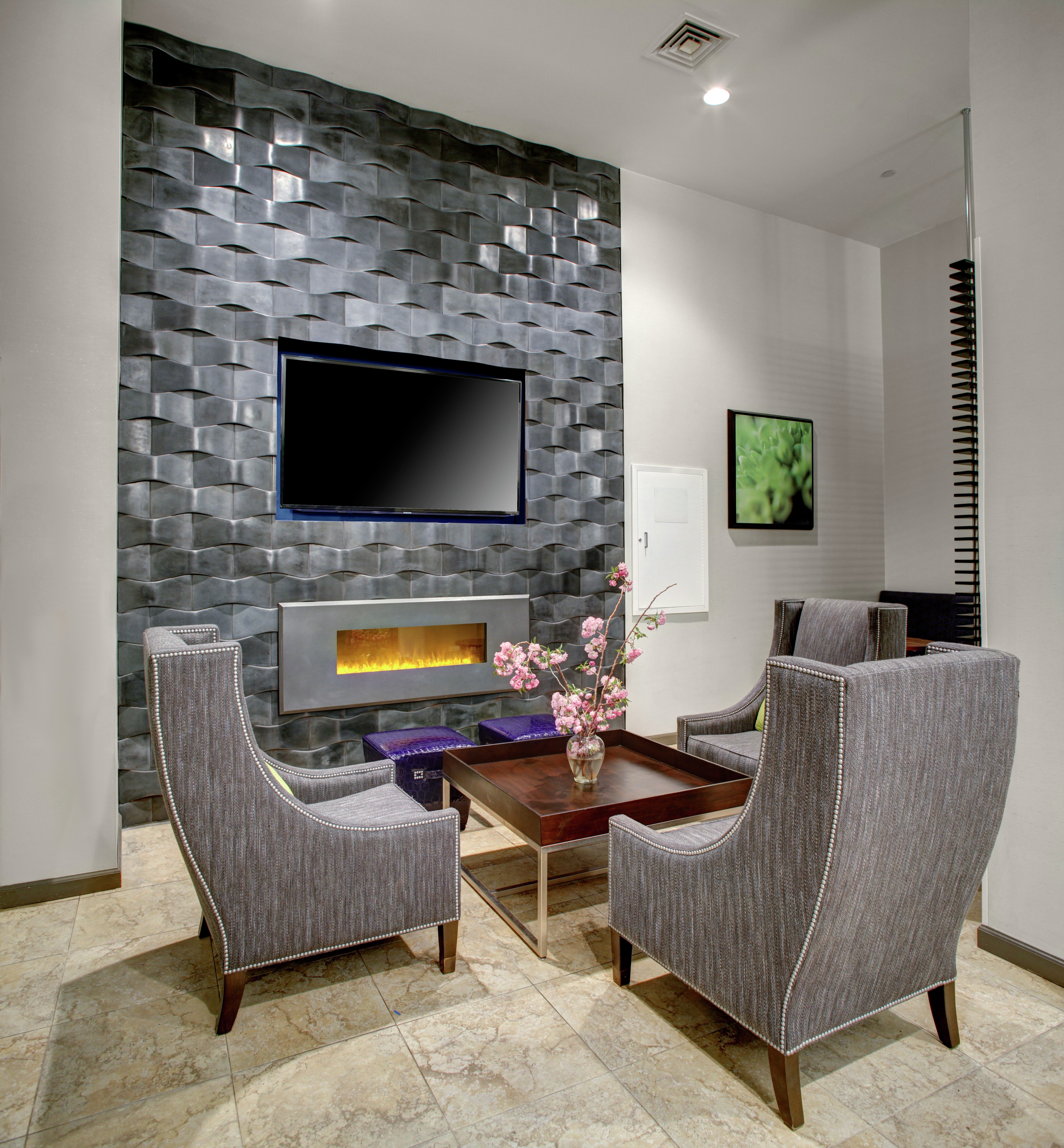 Seating by Fireplace and TV in Lobby