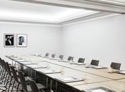 Modern meeting room with tables and chairs