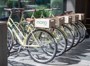 Bikes with Motto by Hilton Logo