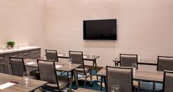 Classroom Style Meeting Room Set Up with Media Screen