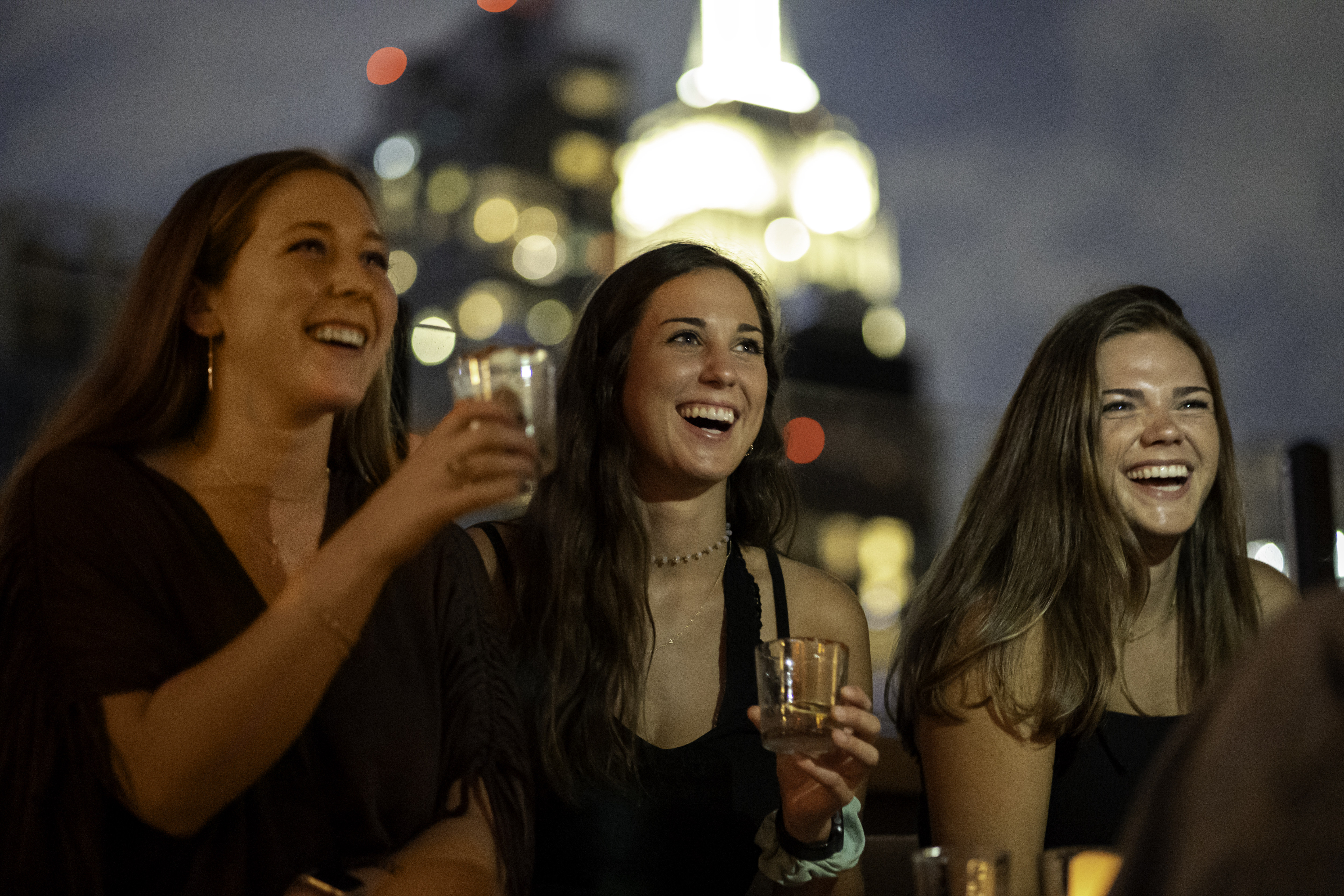 Ladies enjoying drinks at a bar