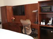 King Room Work Space With TV, Lamp, Microwave, Keurig, and Mini Fridge in Hospitality Center
