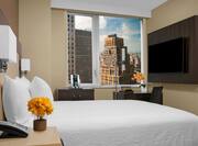 Single Queen Guest Bed with City View