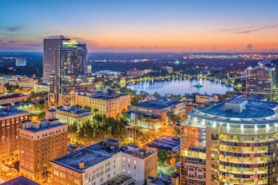 A skyline view of Orlando at dusk. 