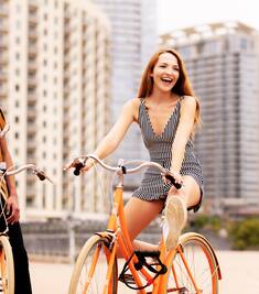 travelers exploring neighborhood on bikes