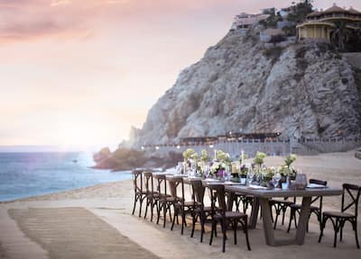 A wedding table set up on the beach