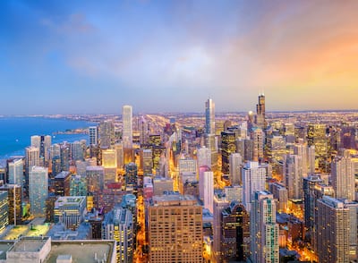 Aerial view of Chicago downtown skyline at sunset from high above.