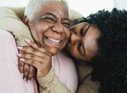 Grandma and granddaughter embracing
