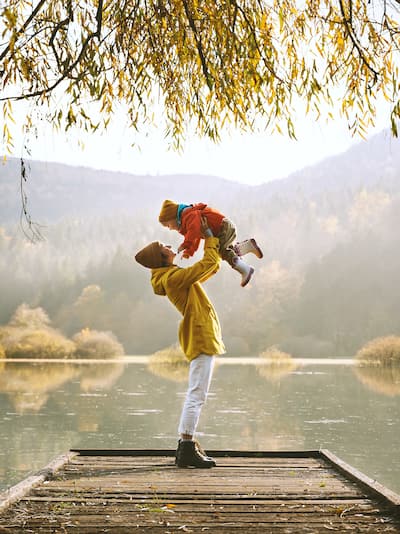 Mother and child lakeside