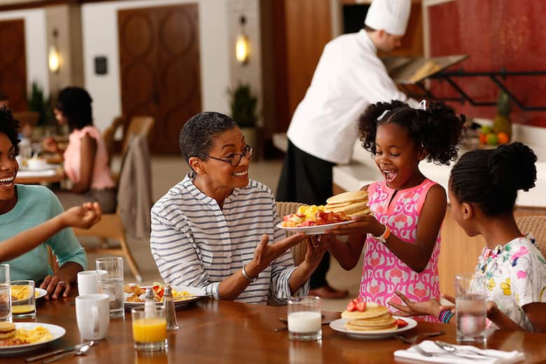 Family enjoying breakfast.