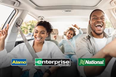 Family in car, with Alamo, Enterprise and National car rental logos overlaid.