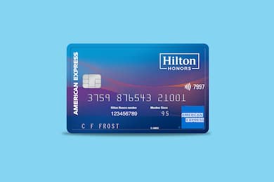 Hilton Honors American Express Surpass Card on a blue background