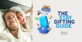 couple in bathrobes with a cartoon sunitcase and the words The Stay Gifting Guide