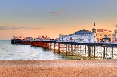 View of Brighton Beach Pier at sunset.