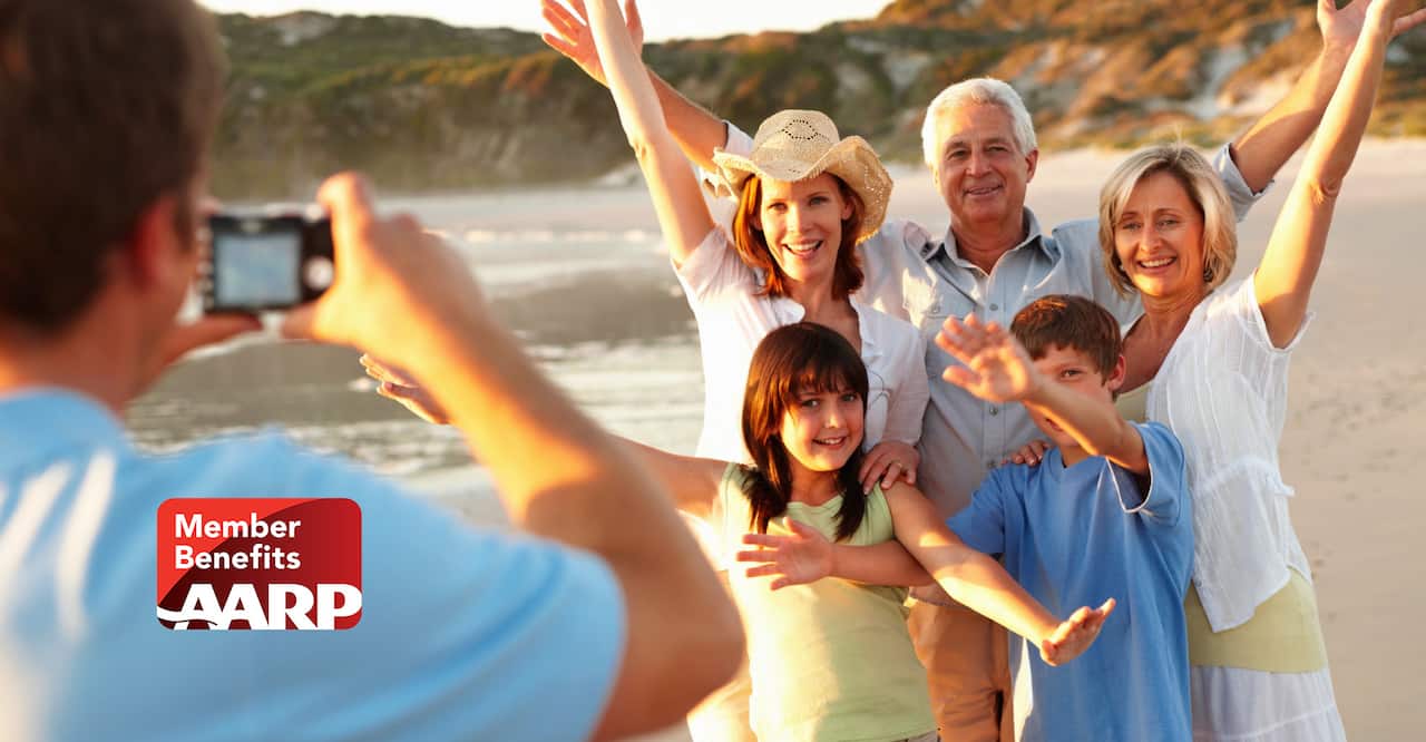 Multi-generational Family Posing on Beach with AARP logo