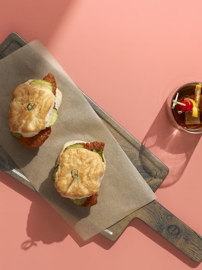 Nashville Hot Chicken Sliders And Old fashioned on flat lay.