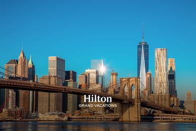 New York City skyline with bridge and HGV logo
