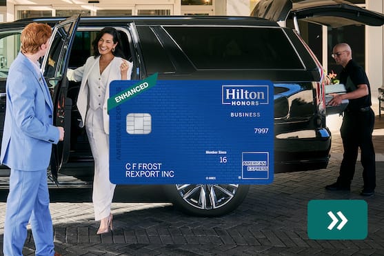 Hilton Honors American Express Business Card with a business women stepping out of a car in the background