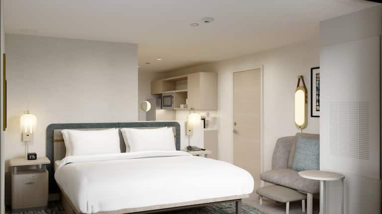 Example rendering of efficiency suite with bed, armchair, fridge, and microwave