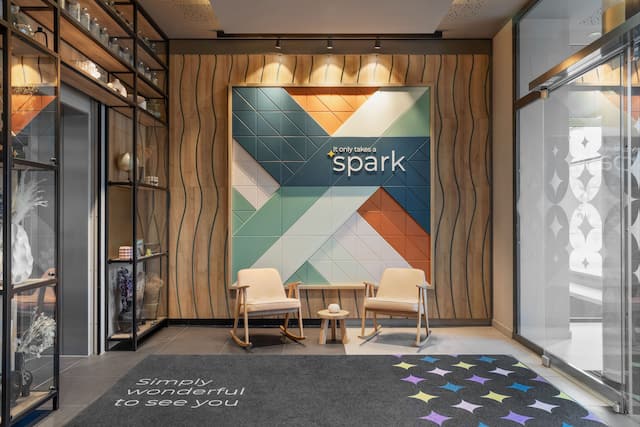 Hotel entrance area with seating area and shelves