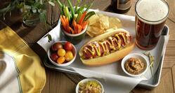 Beer and Bratwurst Dog with Chips and Vegetables