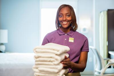 Home2 Suites Housekeeping Holding Towels