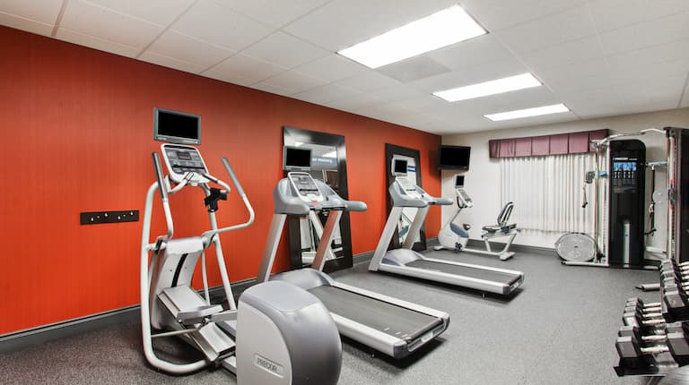 Fitness Center with Cross-Trainer and Treadmills