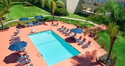 View of Outdoor Pool with Lounge Chairs