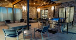 Outdoor Patio with Grills and Seating Area