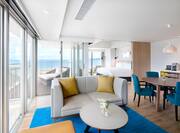 Suite Living Area with Large Windows and Ocean View