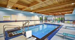Indoor swimming pool with chair lift.