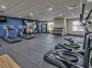 Fitness Center with Cardio Equipment, Free Weights and Windows