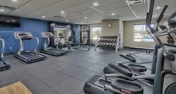 Fitness Center with Cardio Equipment, Free Weights and Windows