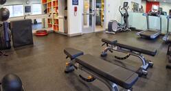 Fitness Area with Weight Balls, Benches, Free Weights and Cardio Equipment