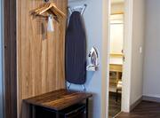 TRU Open Closet with Hangers, Ironing Board, Iron, Shelf and Mini-Fridge
