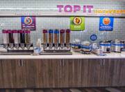Top It Breakfast Bar with Yogurt, Oatmeal, Fruit, Toppings, Cereal and More