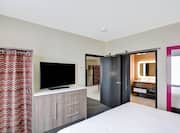 Guest Suite Bedroom with TV Cabinet