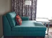 Accessible King Guestroom with Chaise, Lamp, and Table