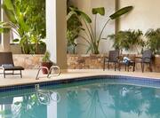 Leisure Seating and Decorative Plants by Indoor Pool