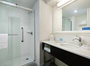 Accessible bathroom with shower and sink