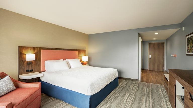Spacious accessible guest room featuring comfortable king bed.