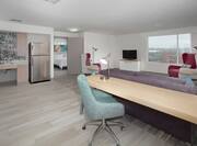 Corner Suite Living Area, Kitchen, and Work Desk