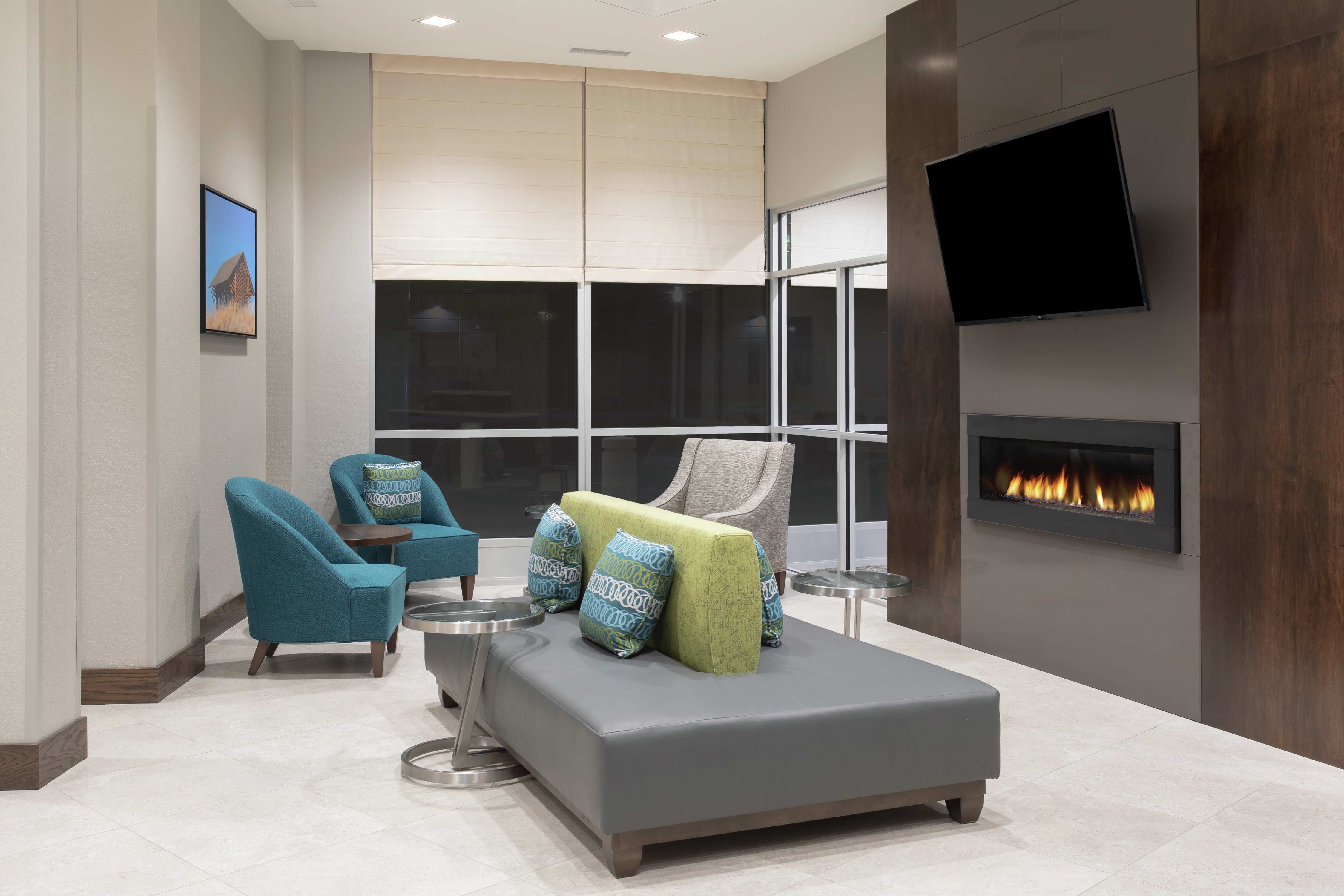 Lobby Lounge Area with TV and Fireplace
