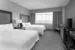 two double beds with tv
