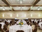 Conference and Event Space with Banquet Style Setup 
