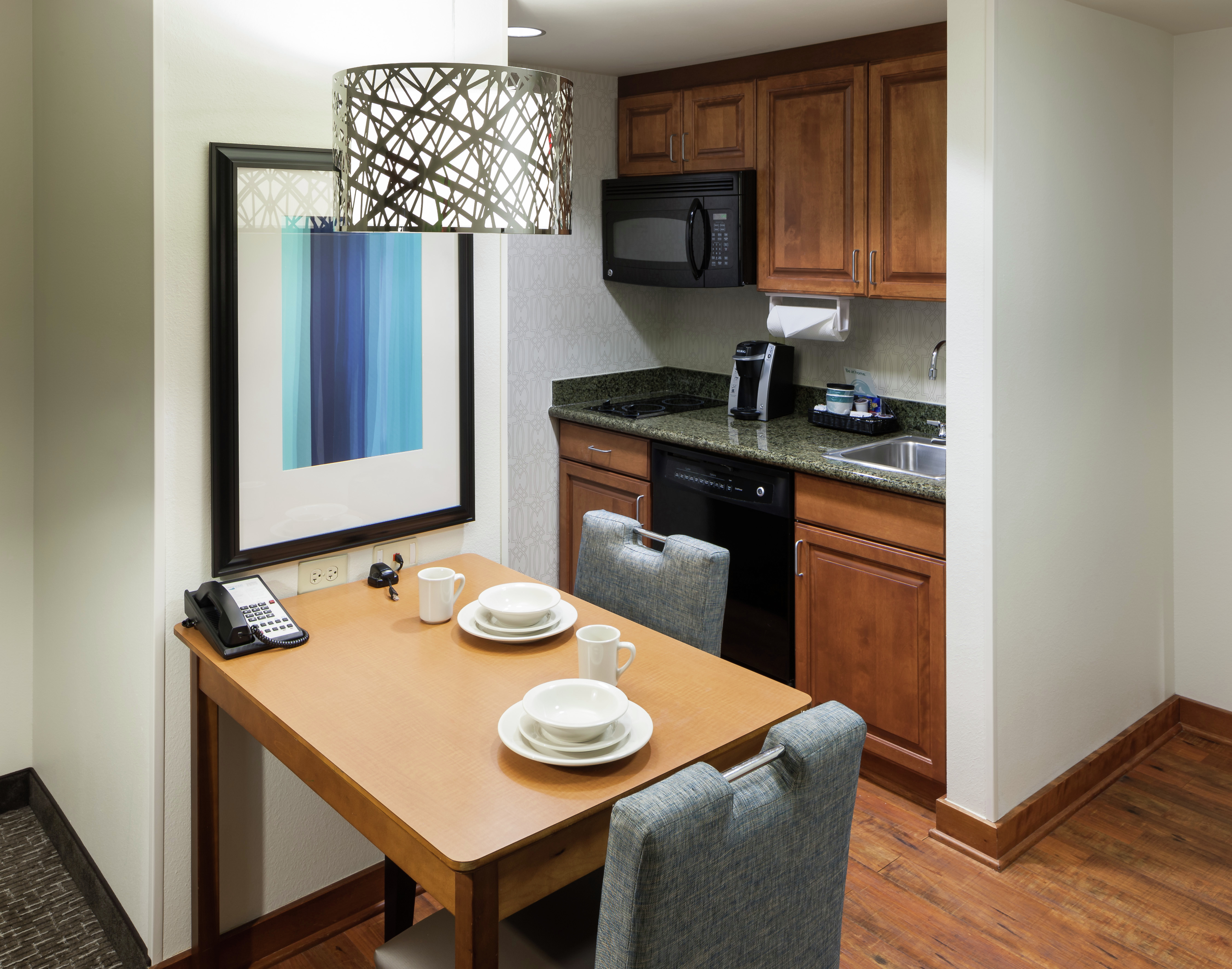 Kitchen and table in guestroom