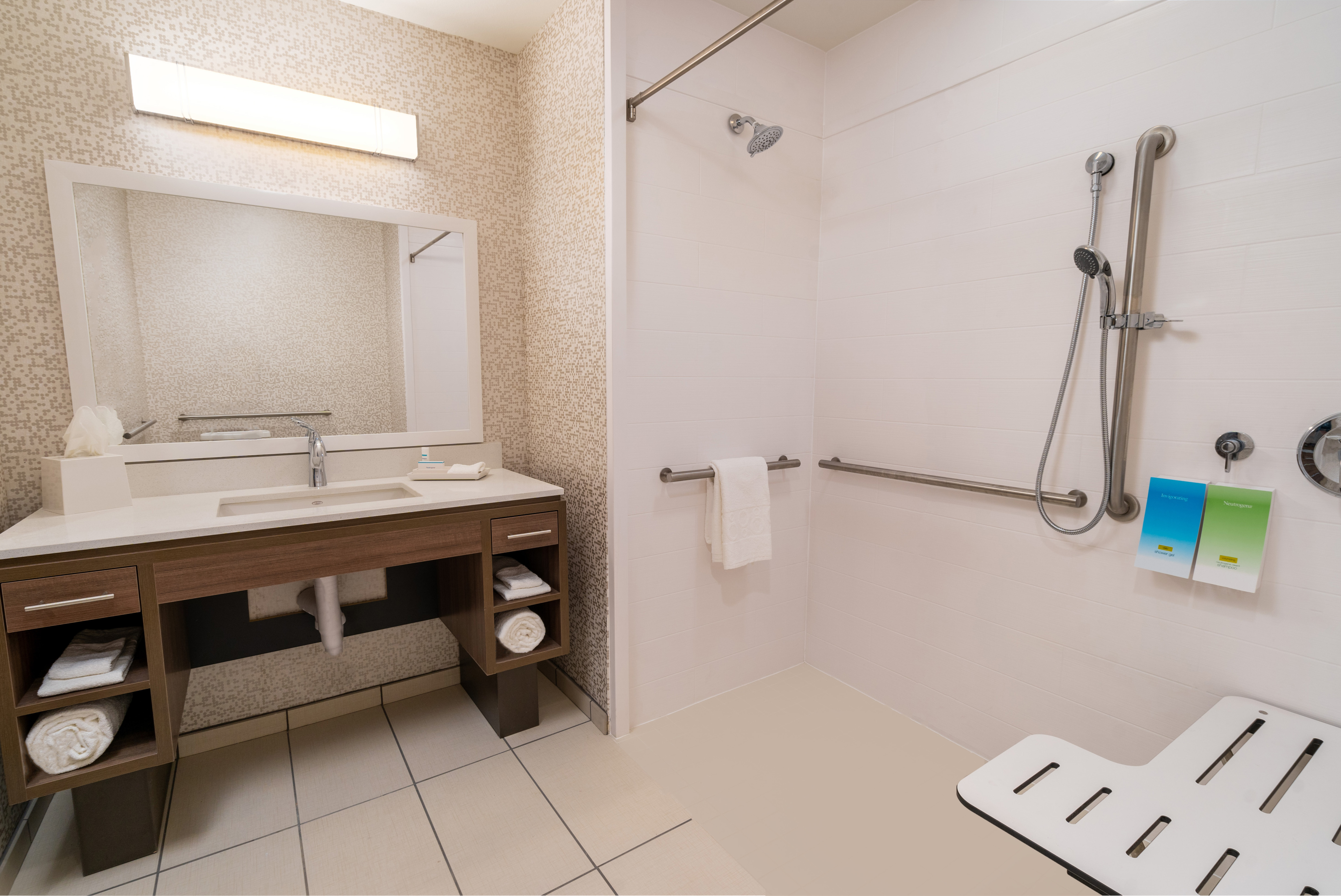 ada bathroom with roll-in shower