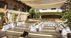 an outdoor wedding table and reception set up