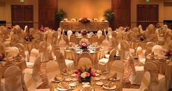 ballroom round tables with linen and table settings